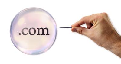 Internet dot com bubble about to explode by a hand with a needle. Concept exposing dot versus new gtlds.